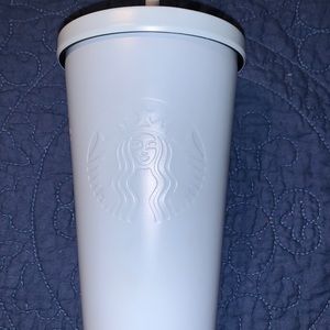Light blue Starbucks cup and straw
